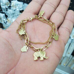 bracelet for women, new with tags , stainless steel , color gold